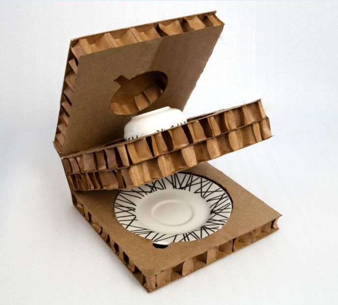 Stacked recycled cardboard design packaging for dining ware