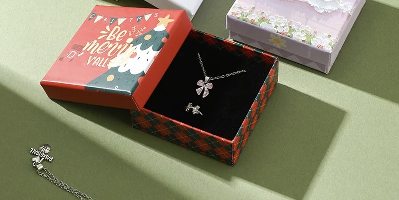 Red box with Christmas pattern and necklace